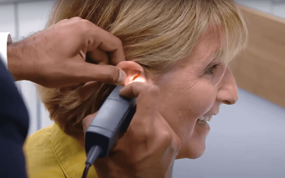 kay adams having hearing test